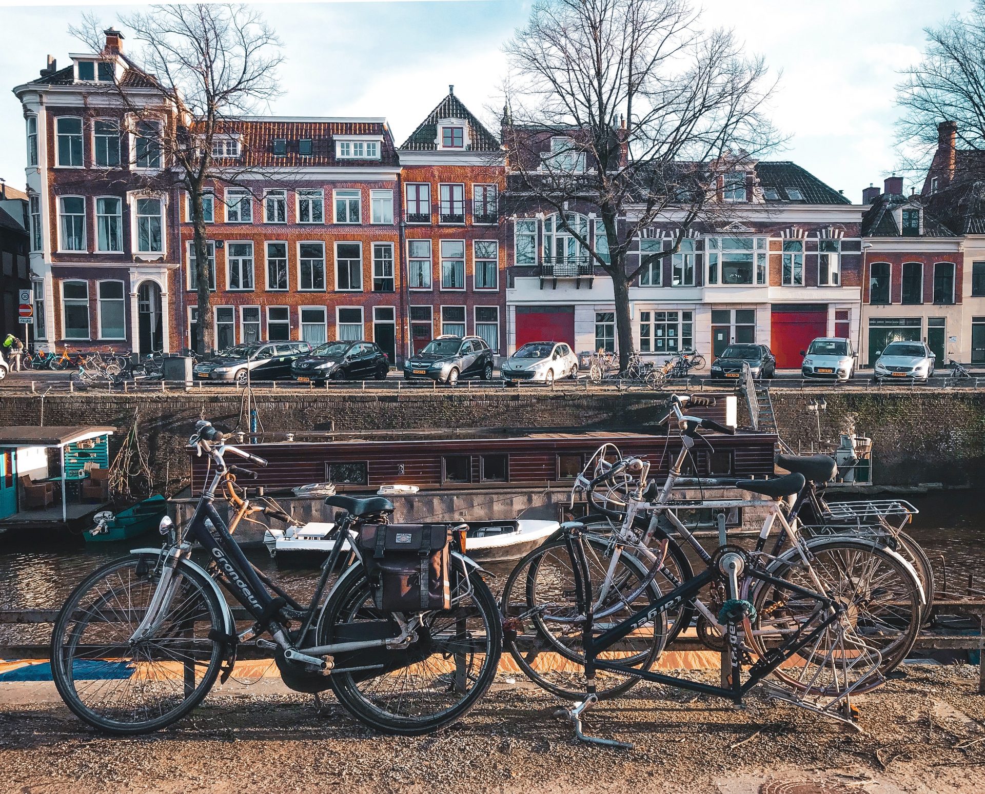 Bicycles Parked Beside Brown Wooden Fence Near A River 3424845